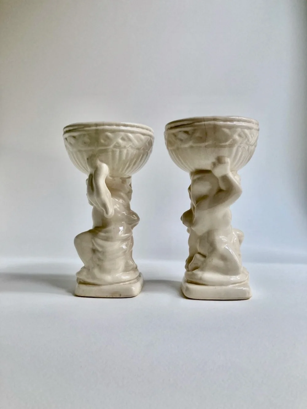 Vintage Rococo Pair of Cream Ceramic Cherub Urns
